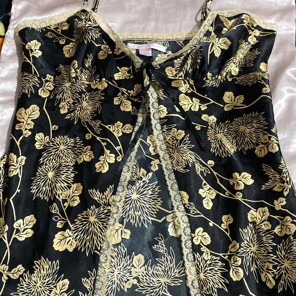 Gold and black print very pretty has lace trim